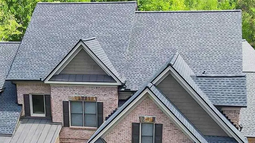 21 9 project large brick house pewter grey shingles 827329f4 1920w