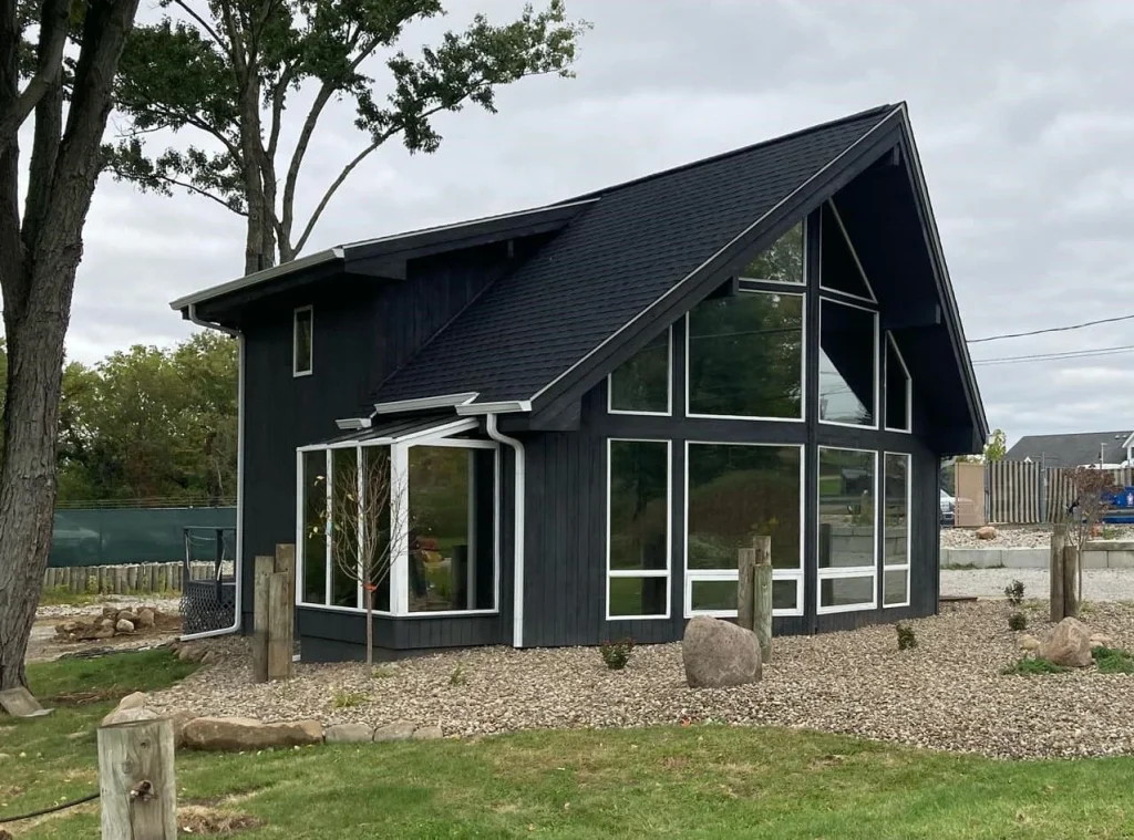  new black asphalt shingle roof and gutter system