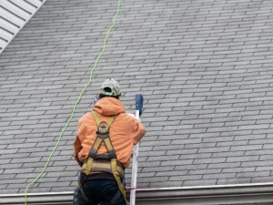 Hometown Roofing contractor performing residential roof inspection in Uniontown